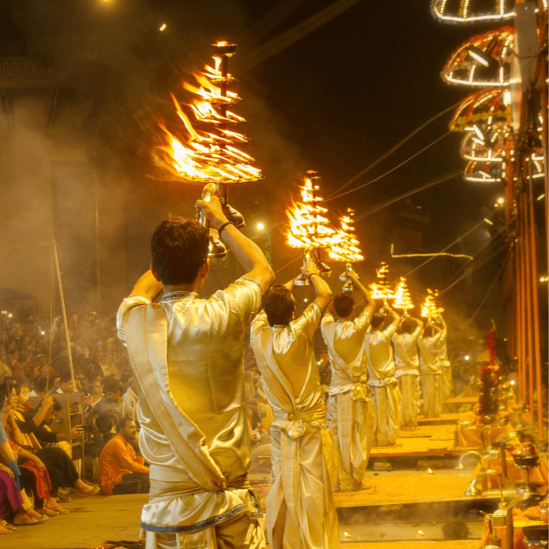 Dev Deepawali evening ritual with flames and smoke